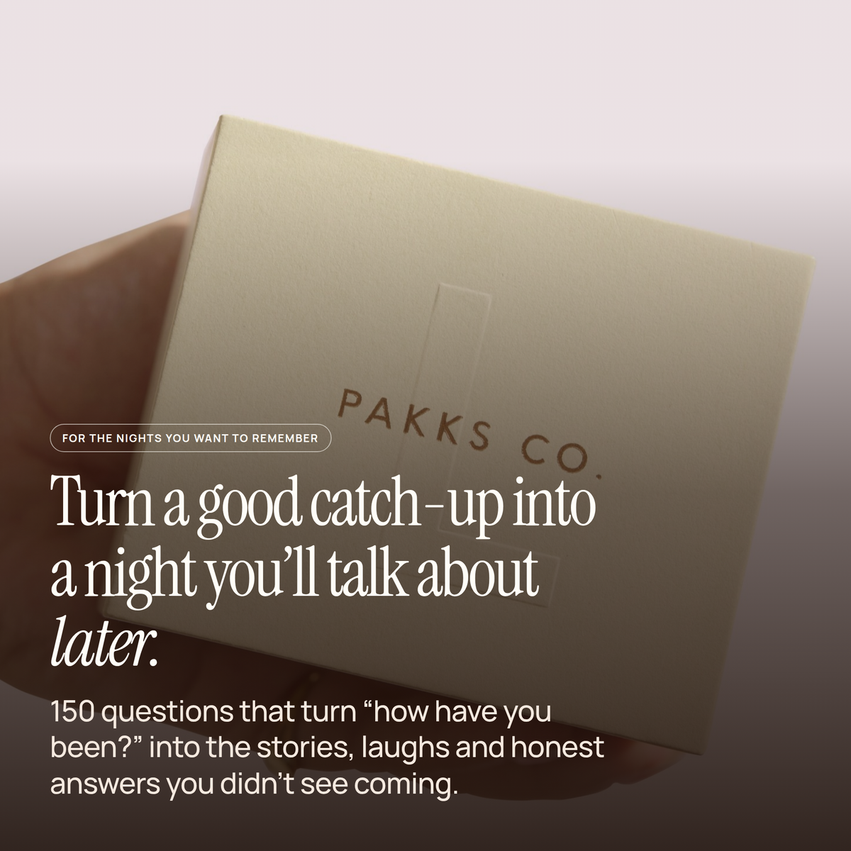 A hand holding the Laughter Deck box, captioned "Turn a good catch-up into a night you'll talk about later."